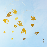 mobile - whimsical tin peace doves