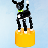 toy - push puppet - black & white dog