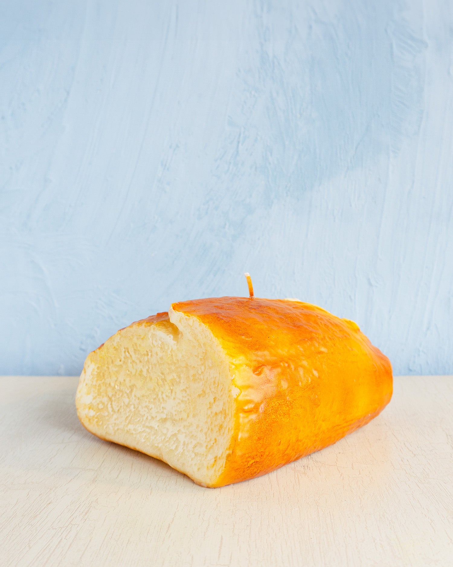 candle - food: half loaf bread