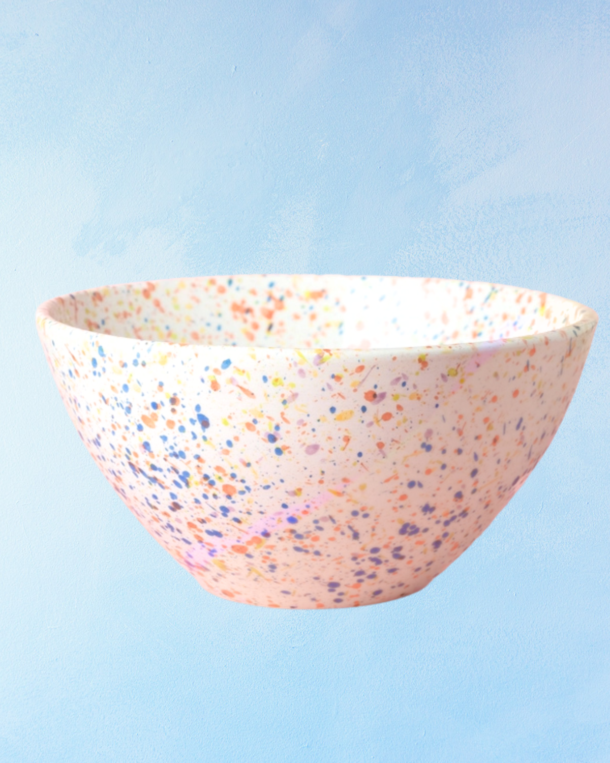 white ceramic salad bowl with rainbow speckle details inside and out