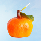 candle - food - clementine with leaf