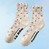 socks - ruffled hugger - cream petal