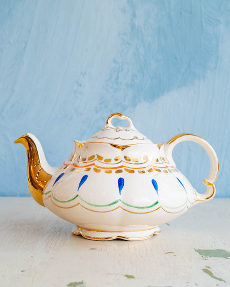 curated tea pot with colourful details