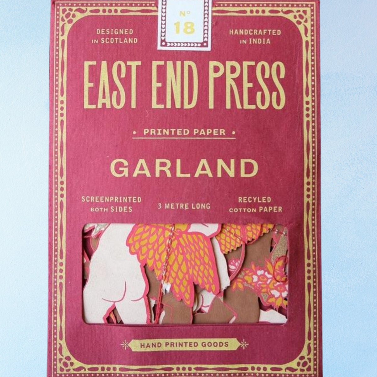 East End Press Garland printed paper packaging on a light blue background