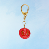 keychain - uncanny half cherry tomato