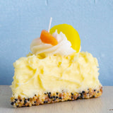 candle - food - slice of lemon chiffon cake