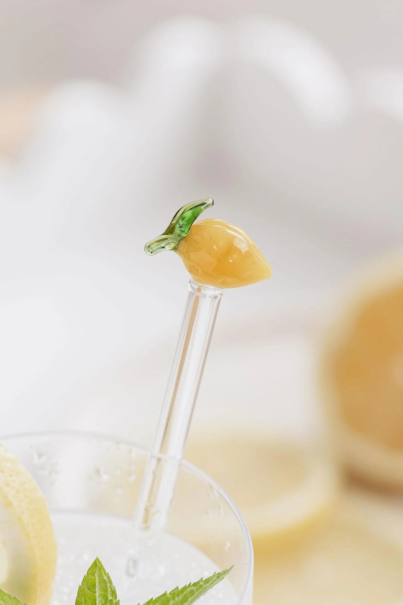 glass lemon drink stirrer