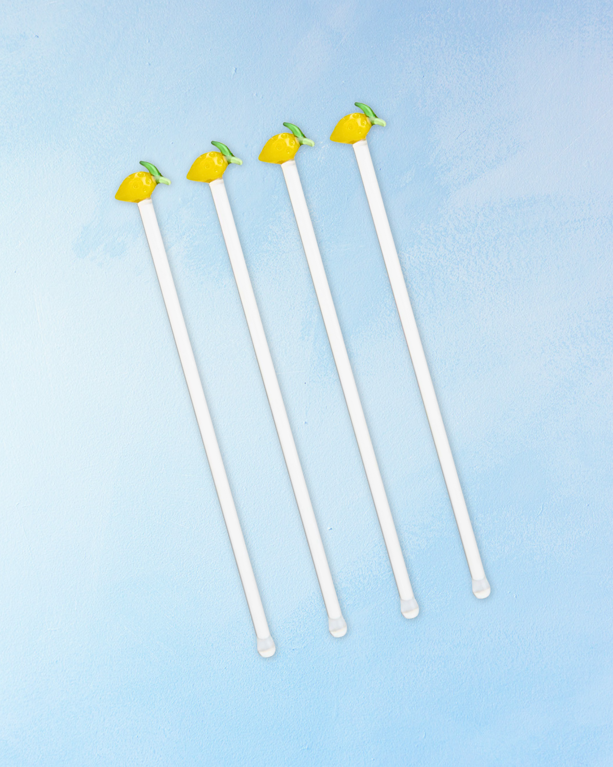 glass lemon drink stirrer