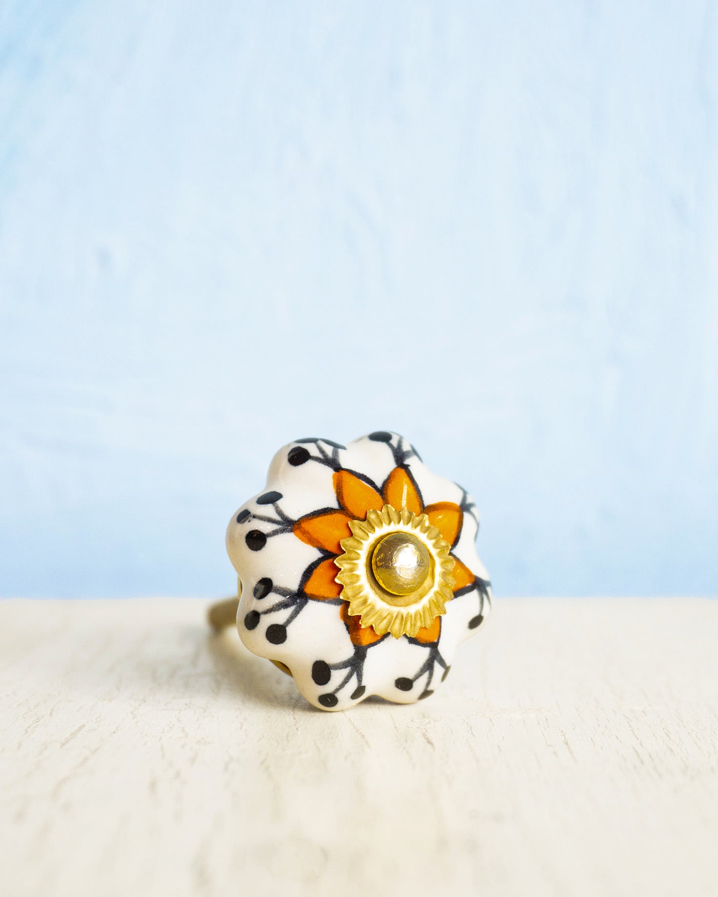 ceramic furniture knob - small floral orange and black