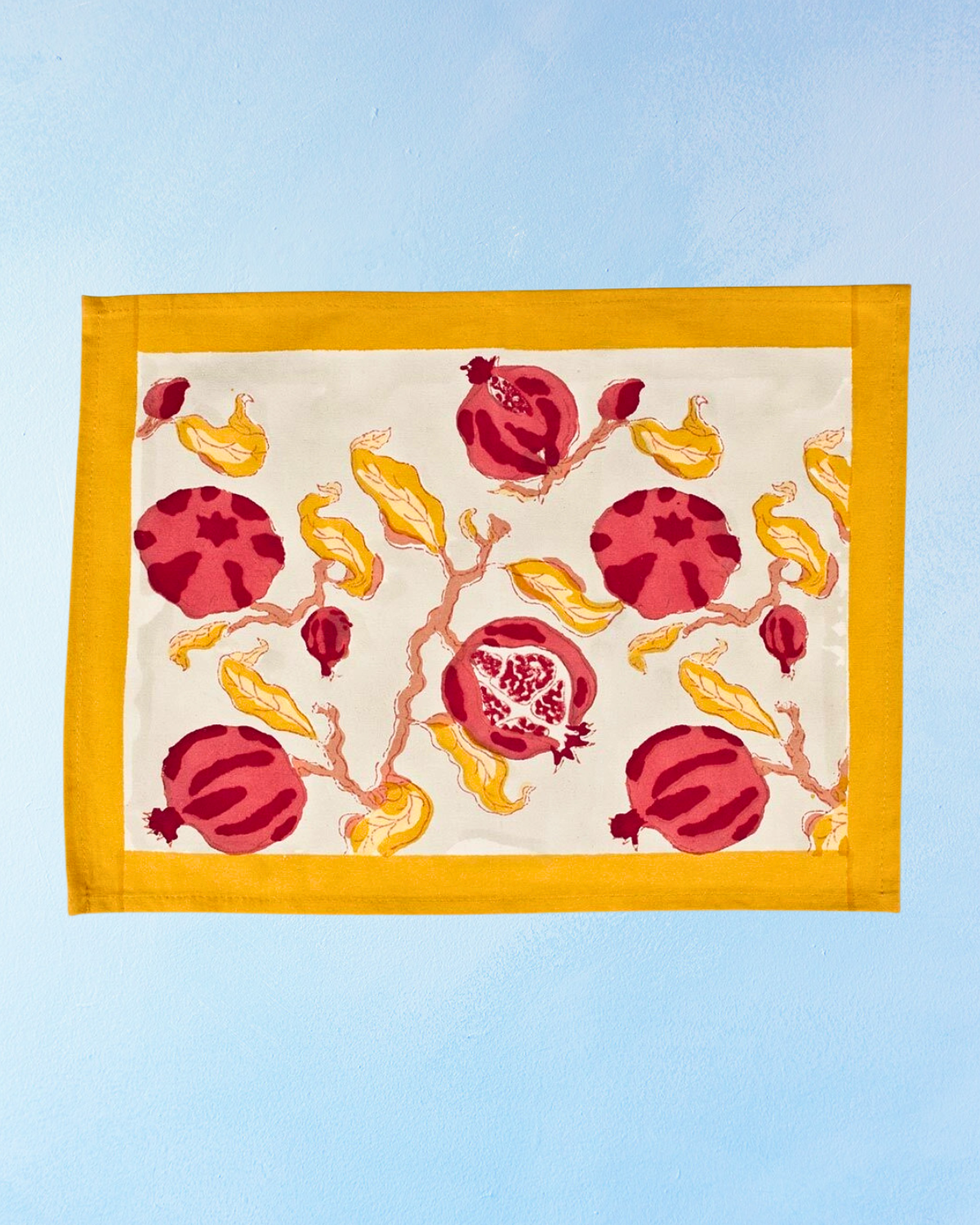 placemats - pomegranate yellow and red
