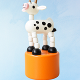 toy - push puppet: cow