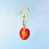 keychain - uncanny quarter cherry tomato