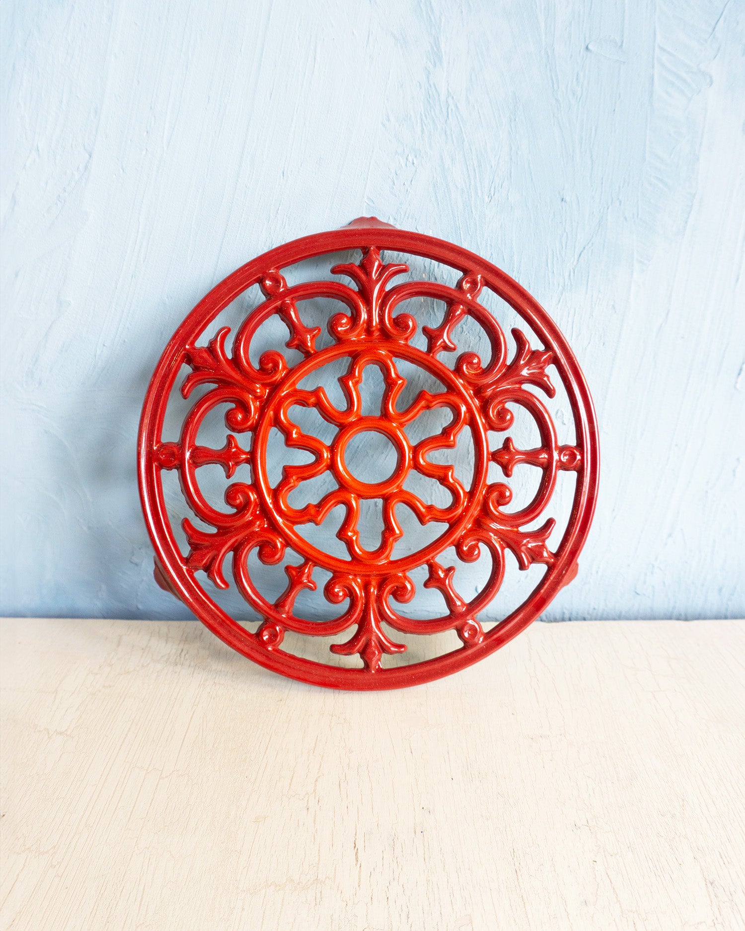 enameled cast iron trivet - red