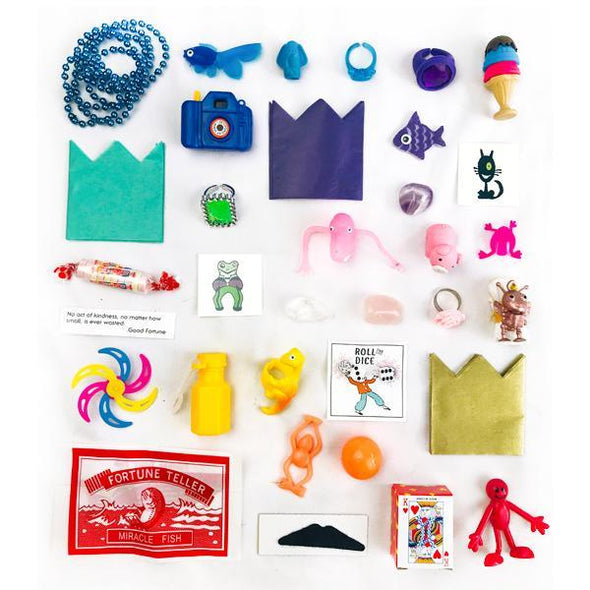 A variety of toys and trinkets found inside the surprise ball.