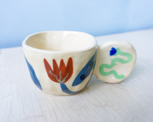 ceramic mug - blue red bending tulip