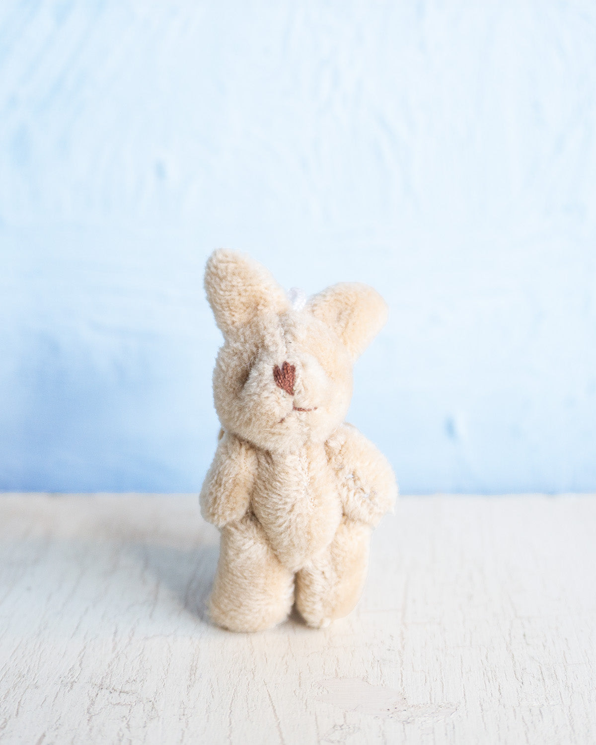 small charm - teeny tiny beige bunny