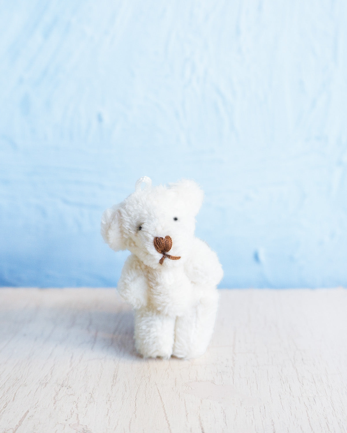 small charm - teeny cream teddy