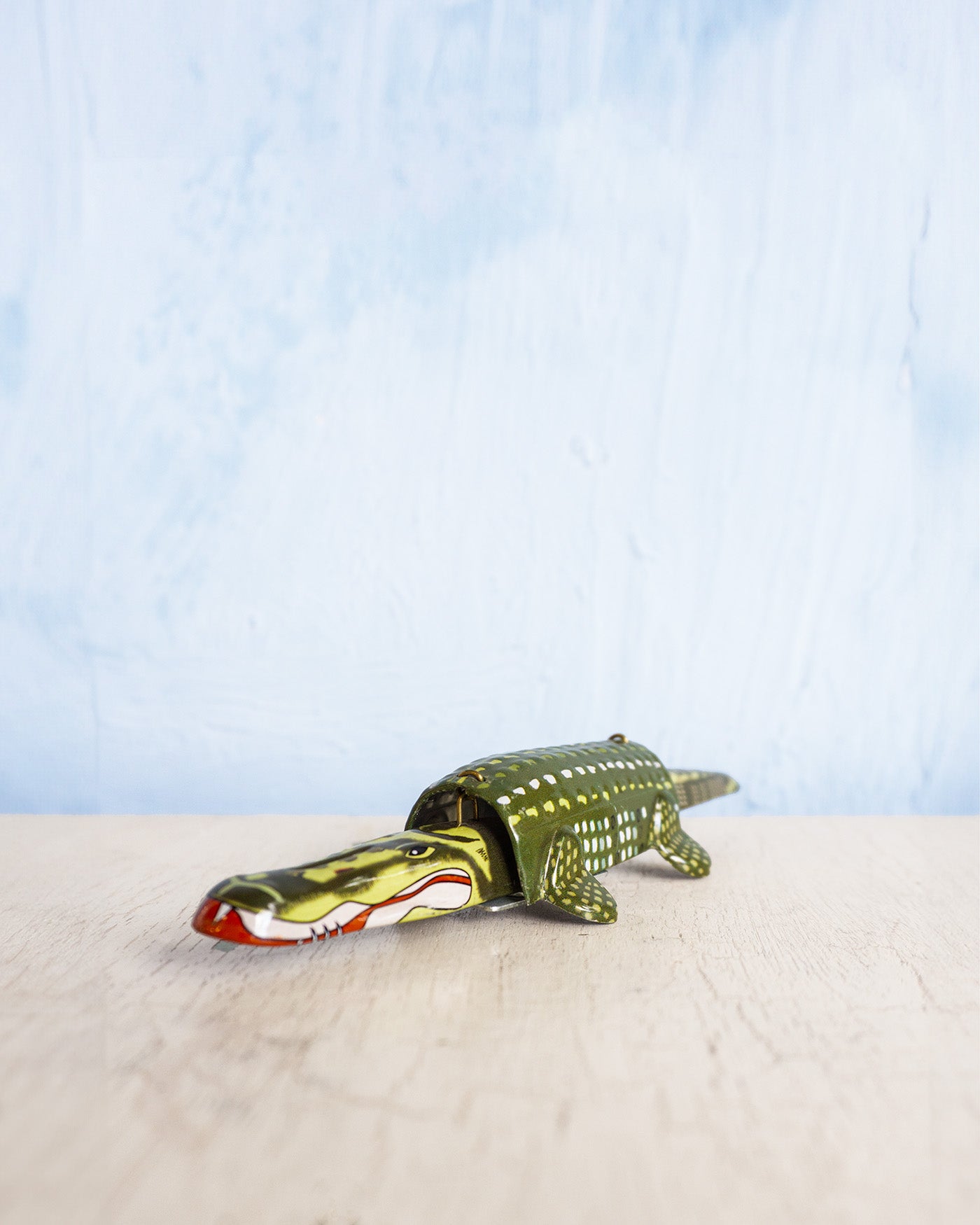 toy - tin wobbly croc