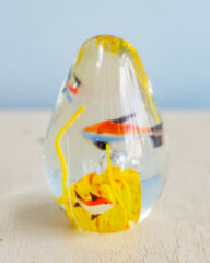 Vintage glass paper weight with little fish designs