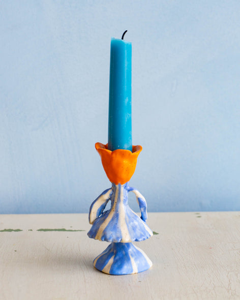 Toni Darling Frank blue and orange tulip candlestick holder with a short blue candlestick