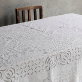 Handmade white cotton cutwork tablecloth. 