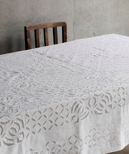 Handmade white cotton cutwork tablecloth. 