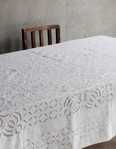 Handmade white cotton cutwork tablecloth. 