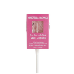 A pink blooming lollipop in the vanilla hibiscus flavour by Amborella Organics.