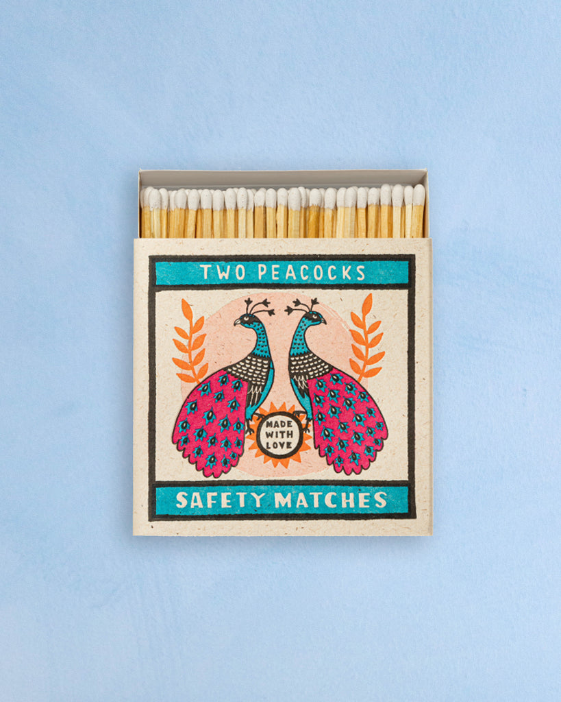 fancy matches - two peacocks