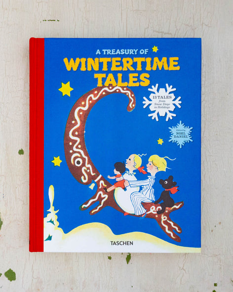 The front cover of A Treasury of Wintertime Tales - children hid into the sky on the back of a reindeer