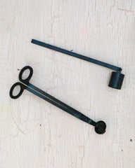 A candle care set of snuffer and wick trimmer