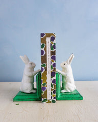 Little cast iron bunny bookends holding up Jane Austen's Mansfield Park
