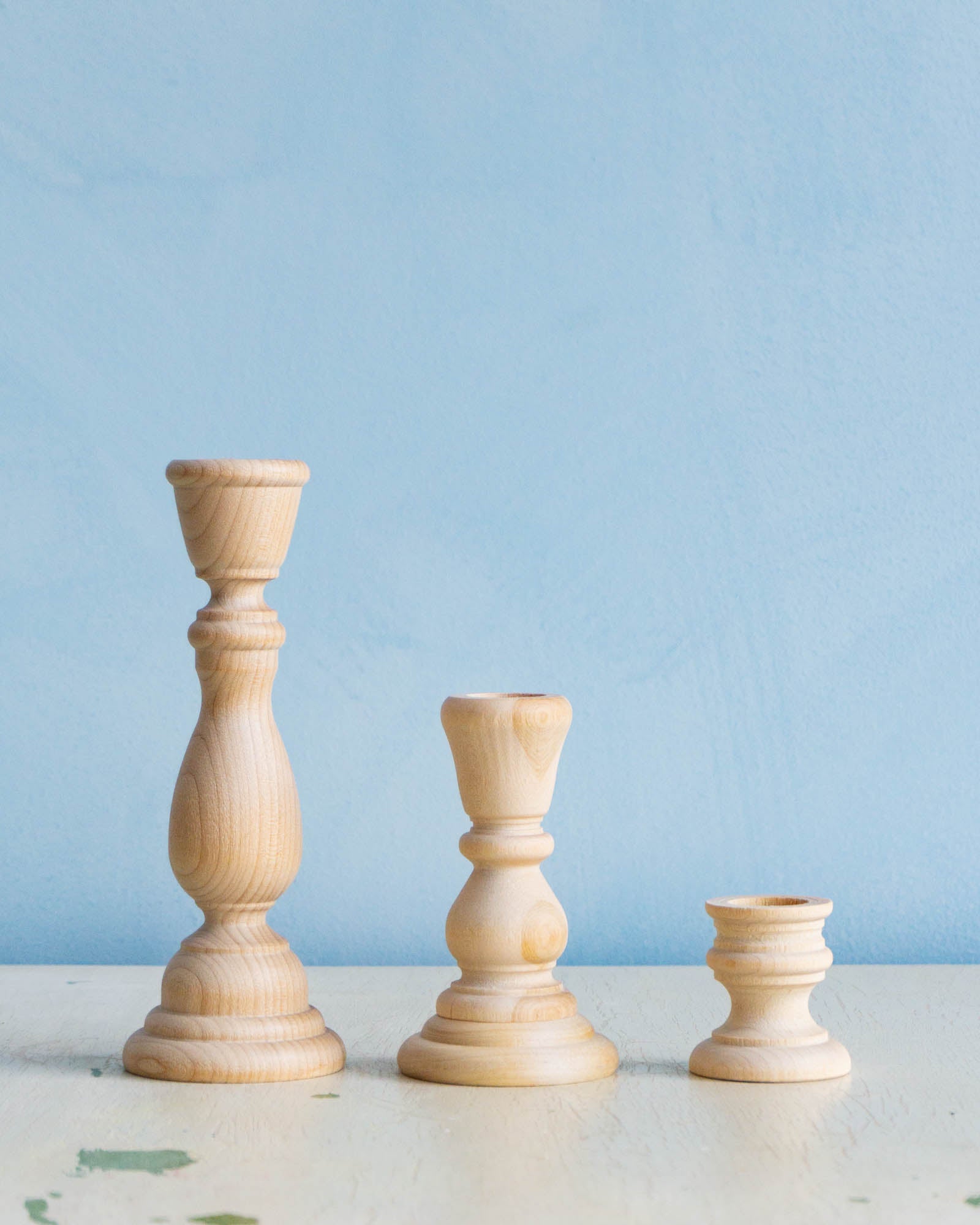 trio of wooden candleholders