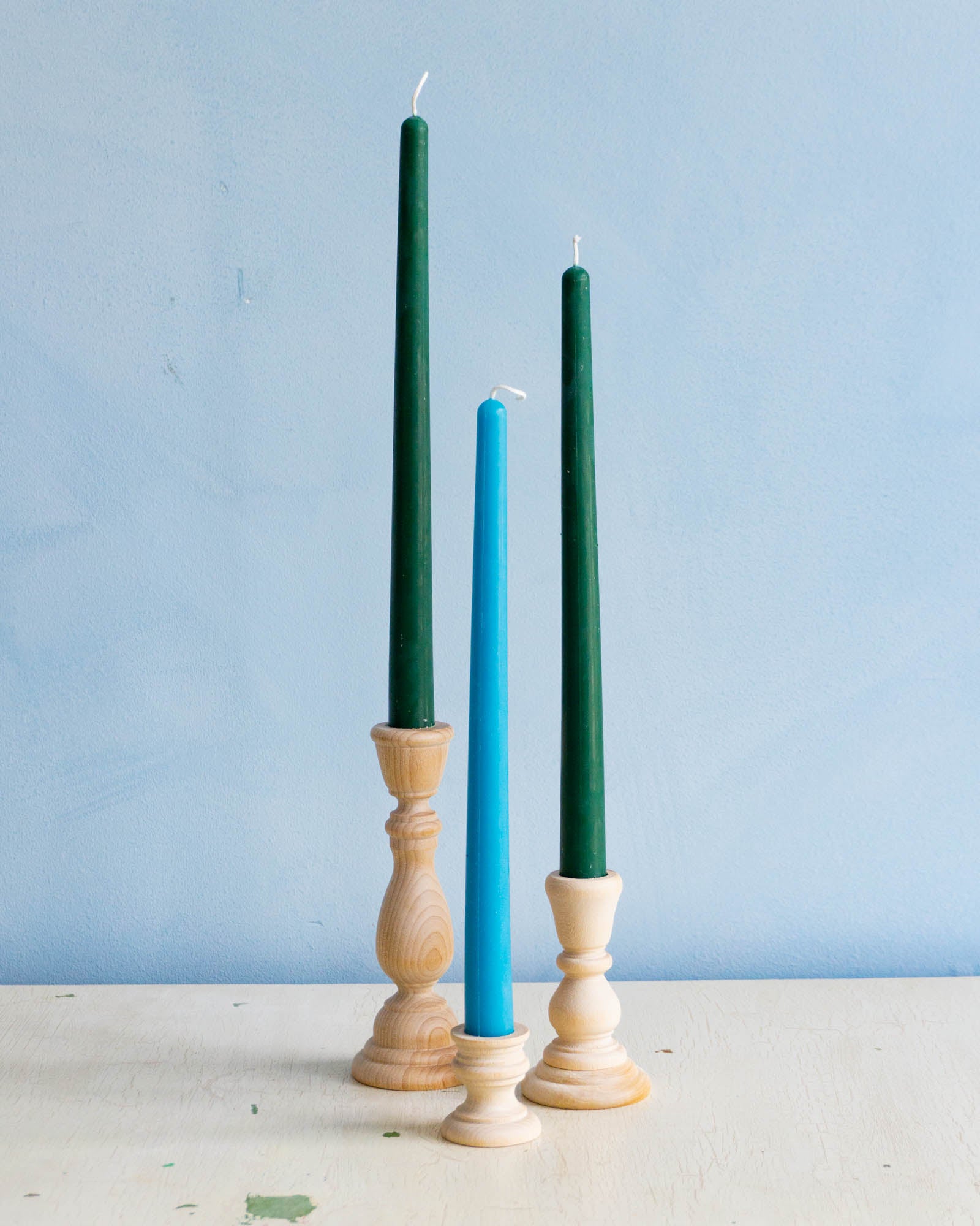trio of wooden candleholders