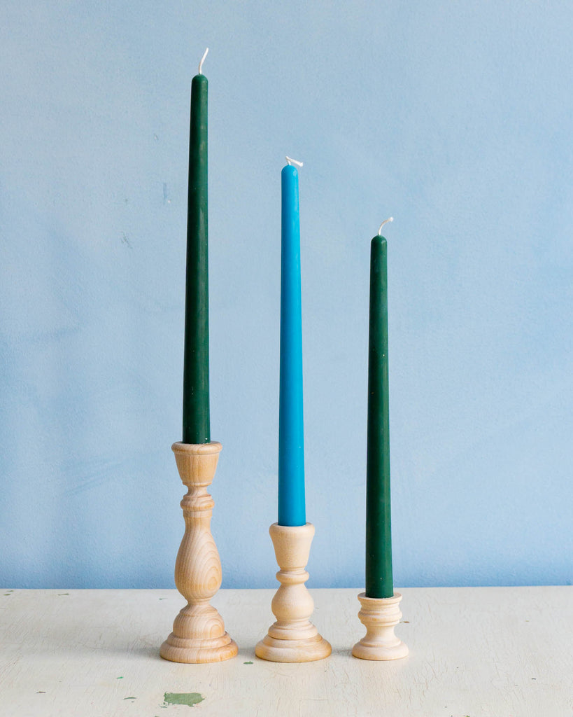 trio of wooden candleholders
