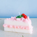 Cereria Introna candle shaped like a slice of cherry cake