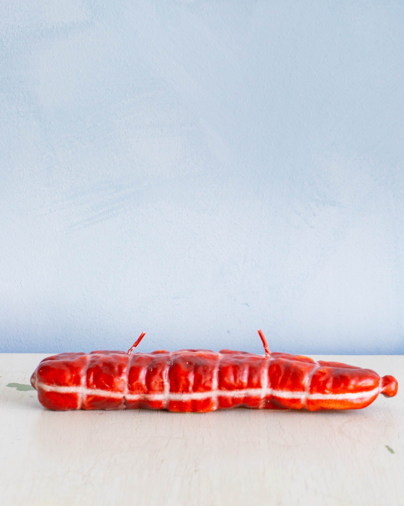 Cereria Introna candle shaped like salami