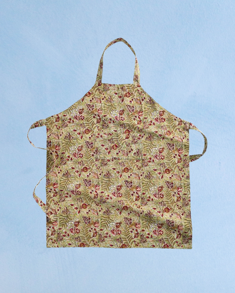 Dusty green apron featuring a patter of berries, vines, and flowers by Couleur Nature.