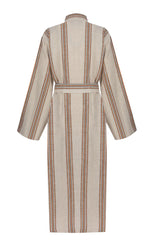 The back of a beige robe with yellow and brown vertical stripes.