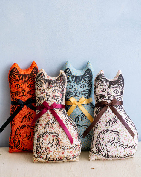 Four calico cat balsam pillows in assorted colours