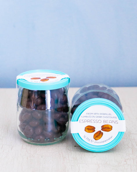 Two jars of chocolate covered espresso beans
