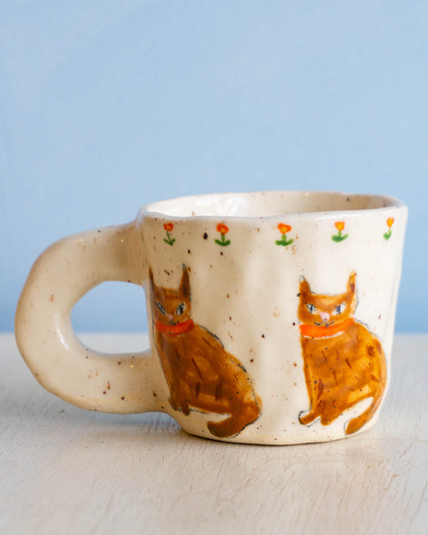 Mug with cats made by ceramicist Toni Darling Frank